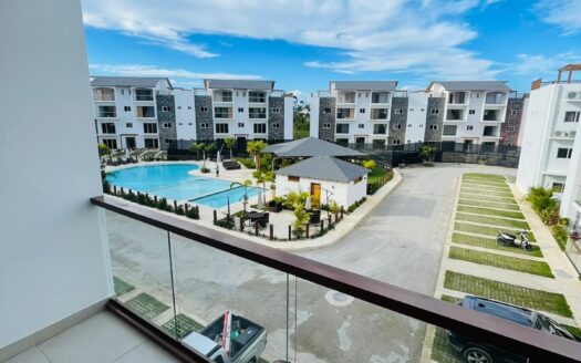 Modern Furnished 3-Bedroom Condo Steps from Popy Beach